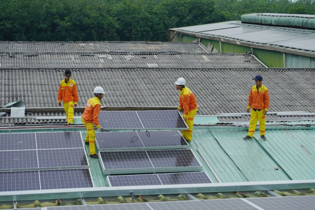 industrial electricians installing solar panels